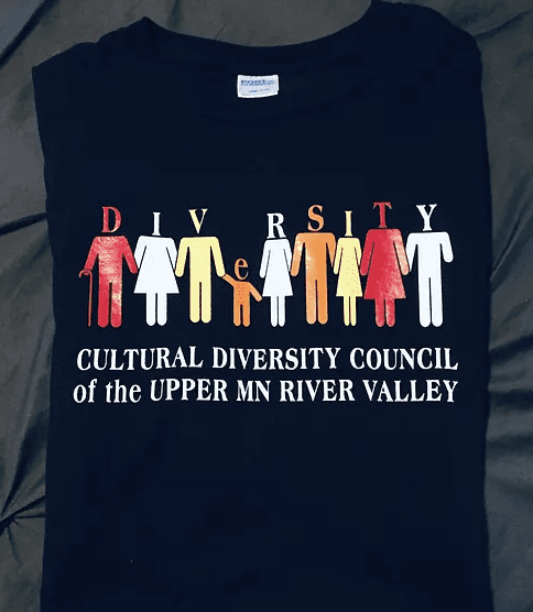 A black shirt with the word diversity written in white letters.