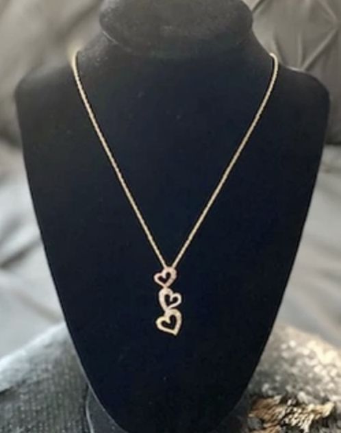 A necklace that is on display in a store.